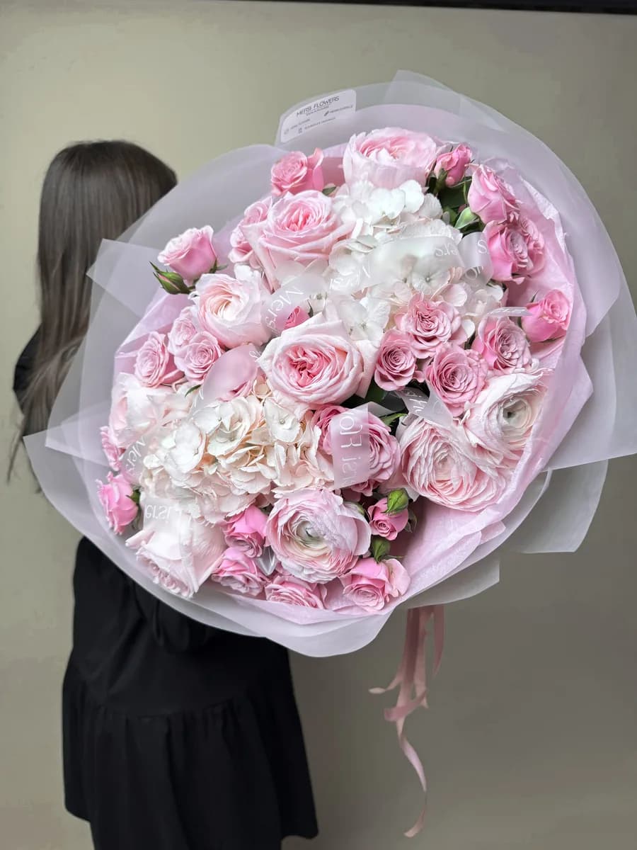 Fusion bouquet of seasonal flowers in shades of pink