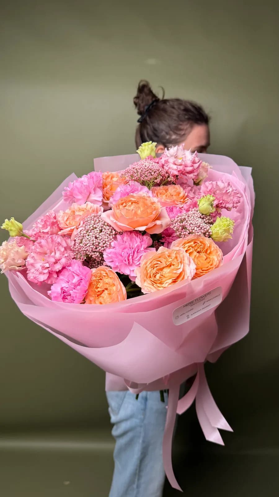 Gentle Flame bouquet of pink and peach spray roses, carnations and lisianthus