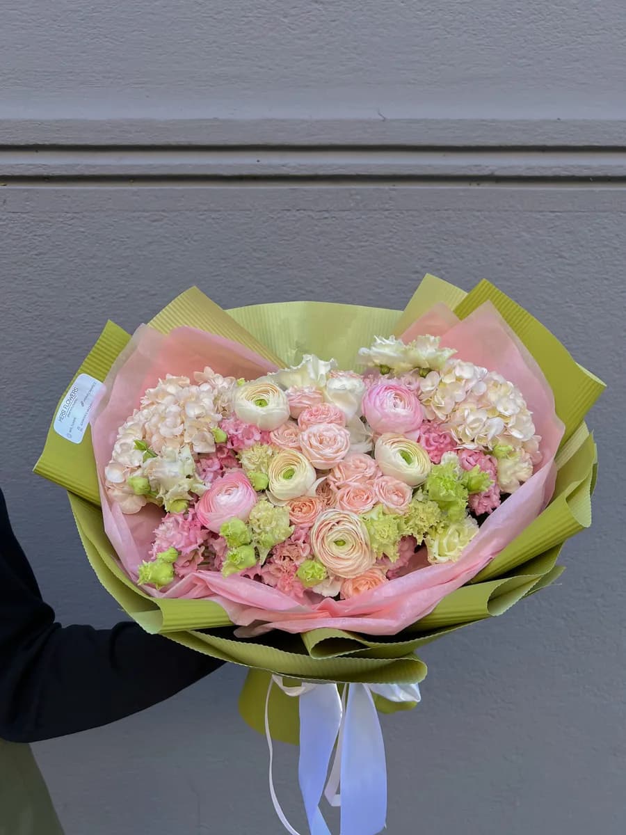 Springtime Reverie Bouquet of seasonal flowers in yellow, pink and green