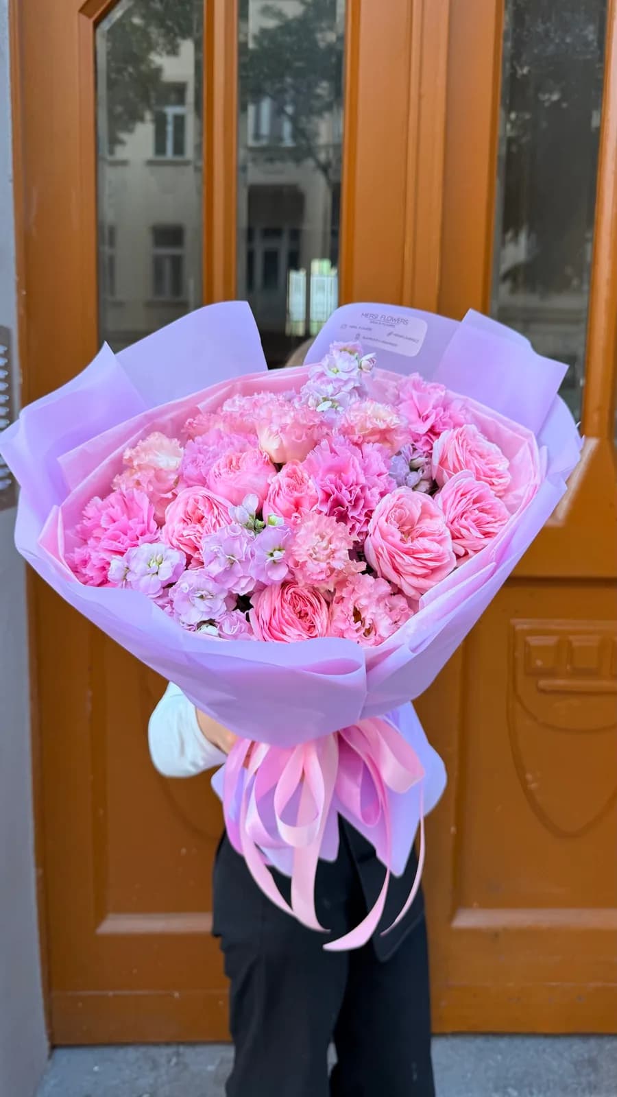 Raspberry Accent bouquet of deep pink spray roses, carnations and stock