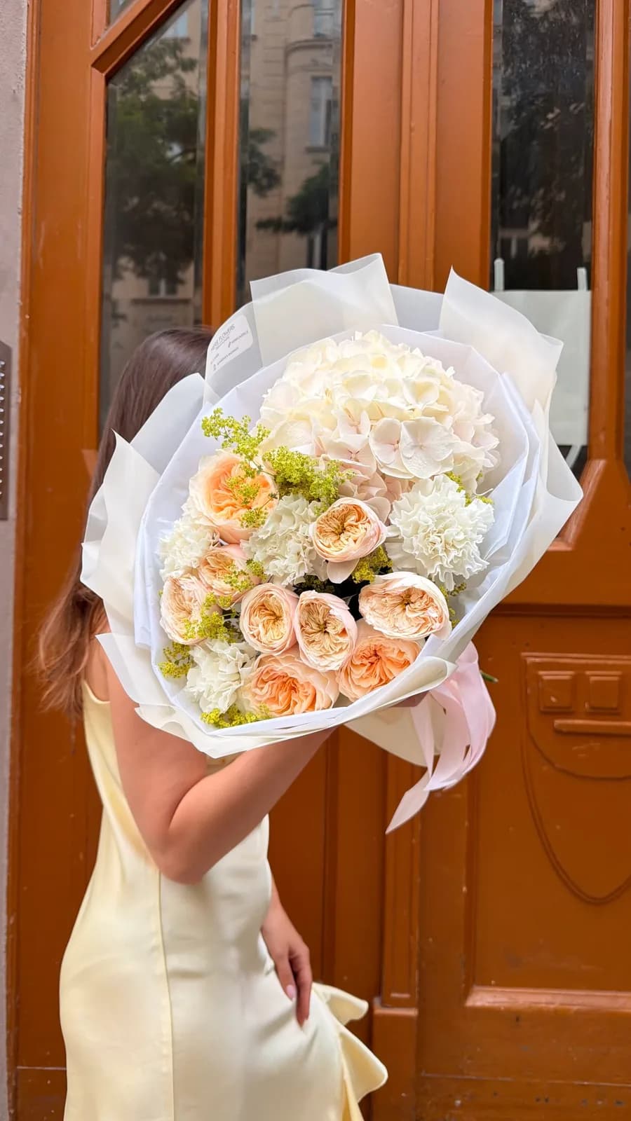 Cream and peach Melody bouquet of hydrangea, garden roses and carnations