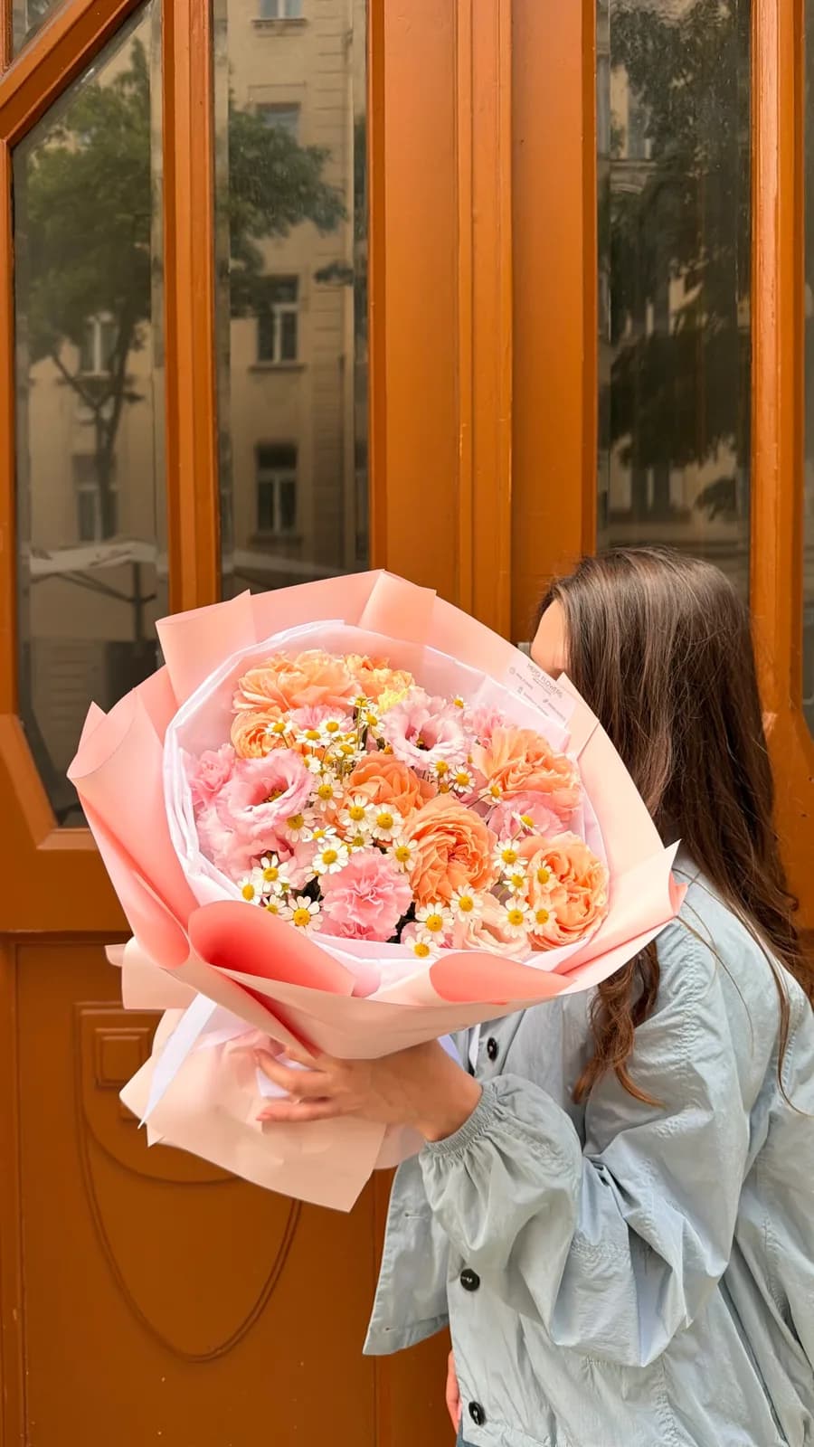 Peach Apricot bouquet of spray roses, lisianthus, carnations and small feverfew