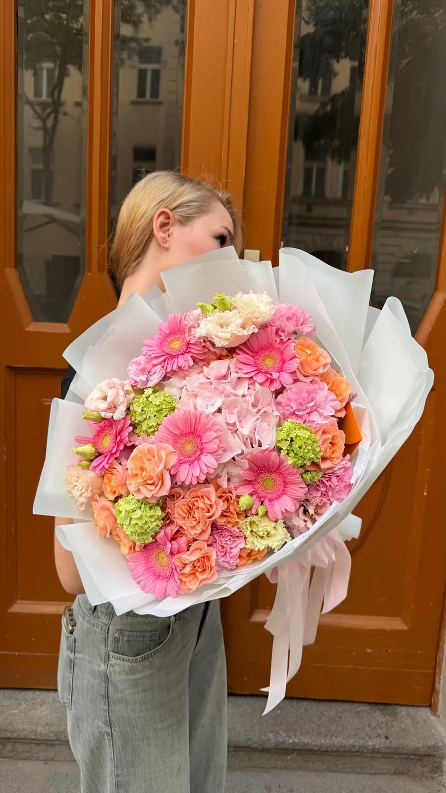 Pastel Joy spring bouquet with gerberas, hydrangea, spray roses and green viburnum