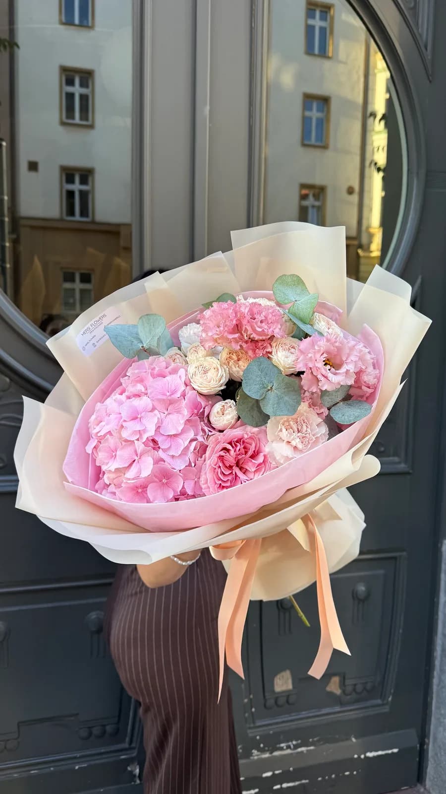 Powder Dream bouquet of powder-pink hydrangea, spray roses, lisianthus and eucalyptus