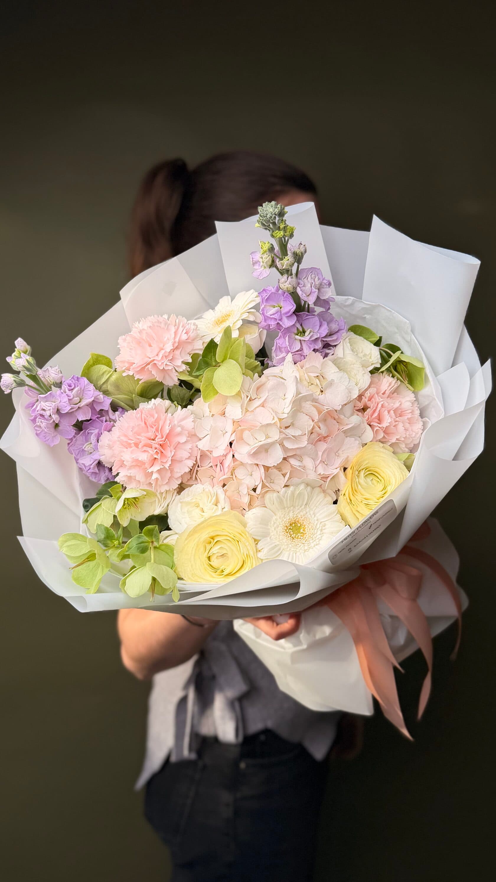 Marshmallow Tenderness pastel bouquet of hydrangea, stock, ranunculus and spray roses